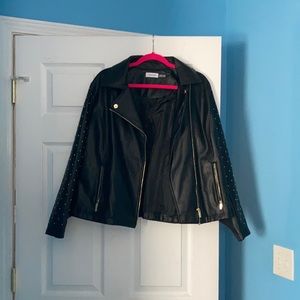 Calvin Klein: studded gold faux leather jacket.